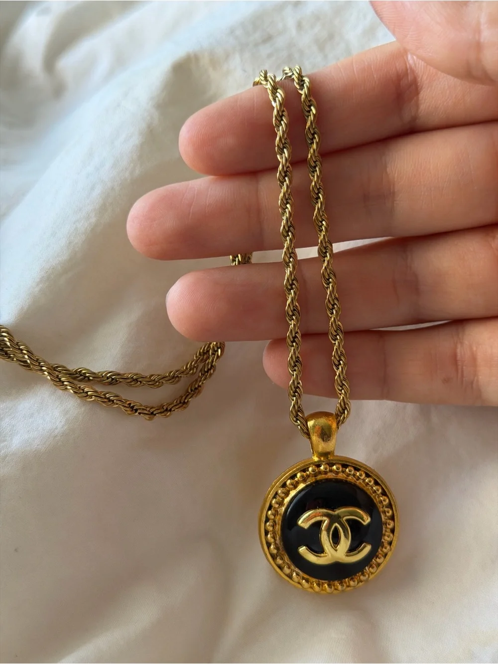 CHANEL Gold and Black Round CC Medallion Necklace